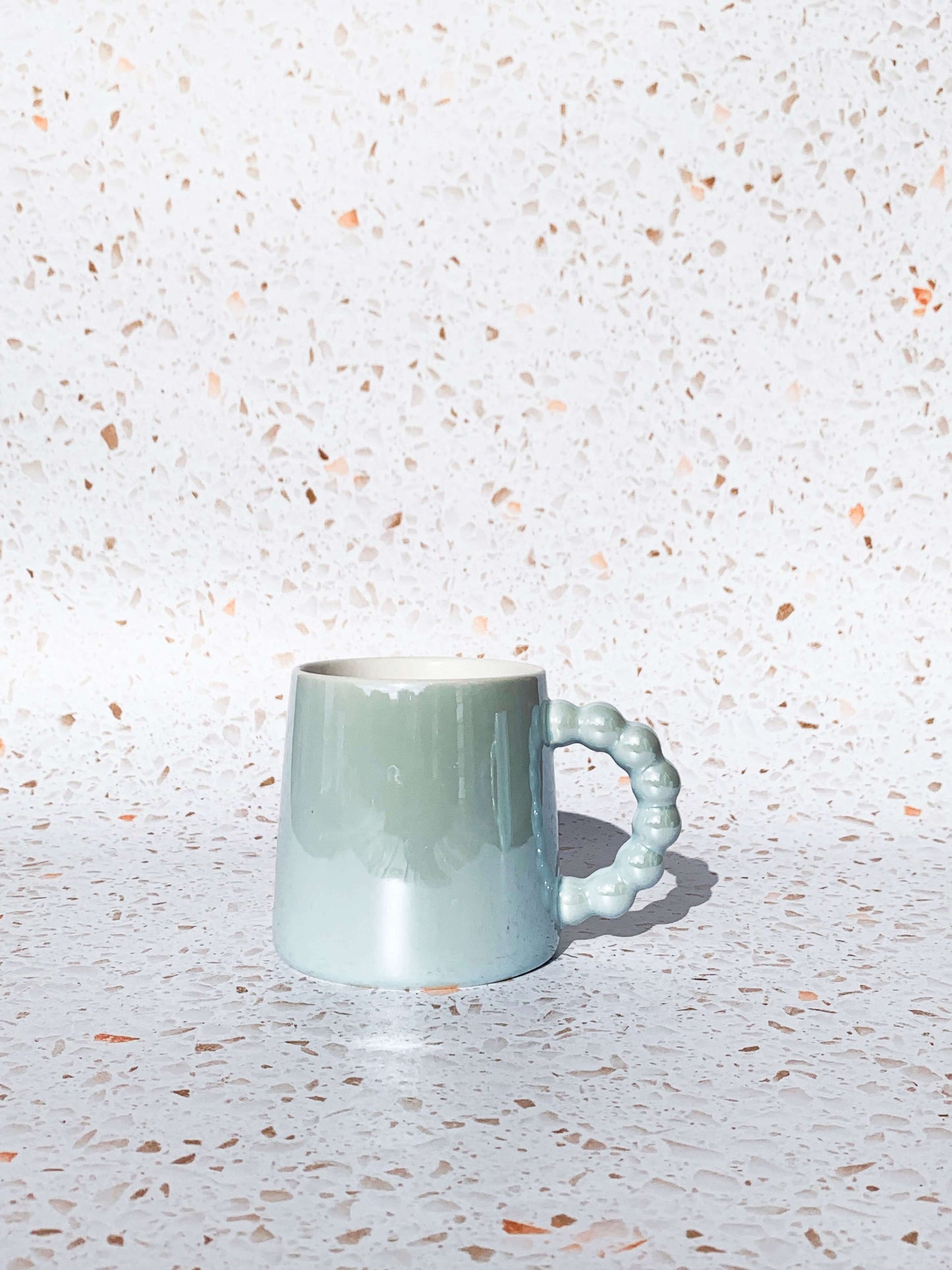 Cute pastel blue coffee or tea mug.
