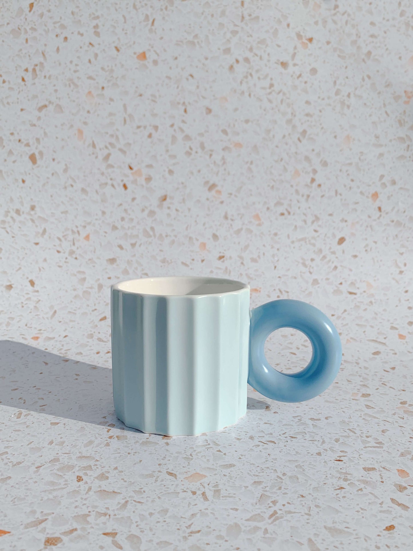 Pastel blue ribbed ceramic mug