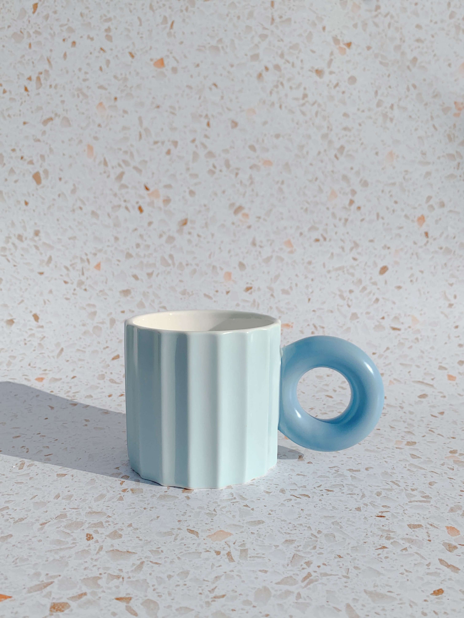 Pastel blue ribbed ceramic mug