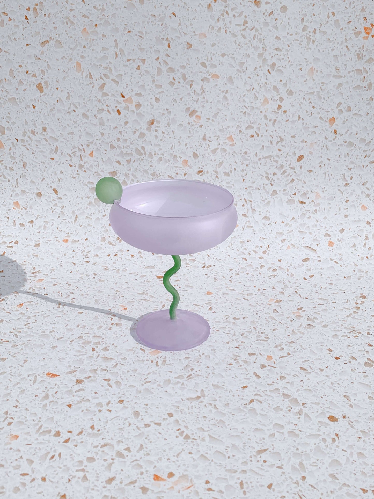 Green and purple fun cocktail martini glass