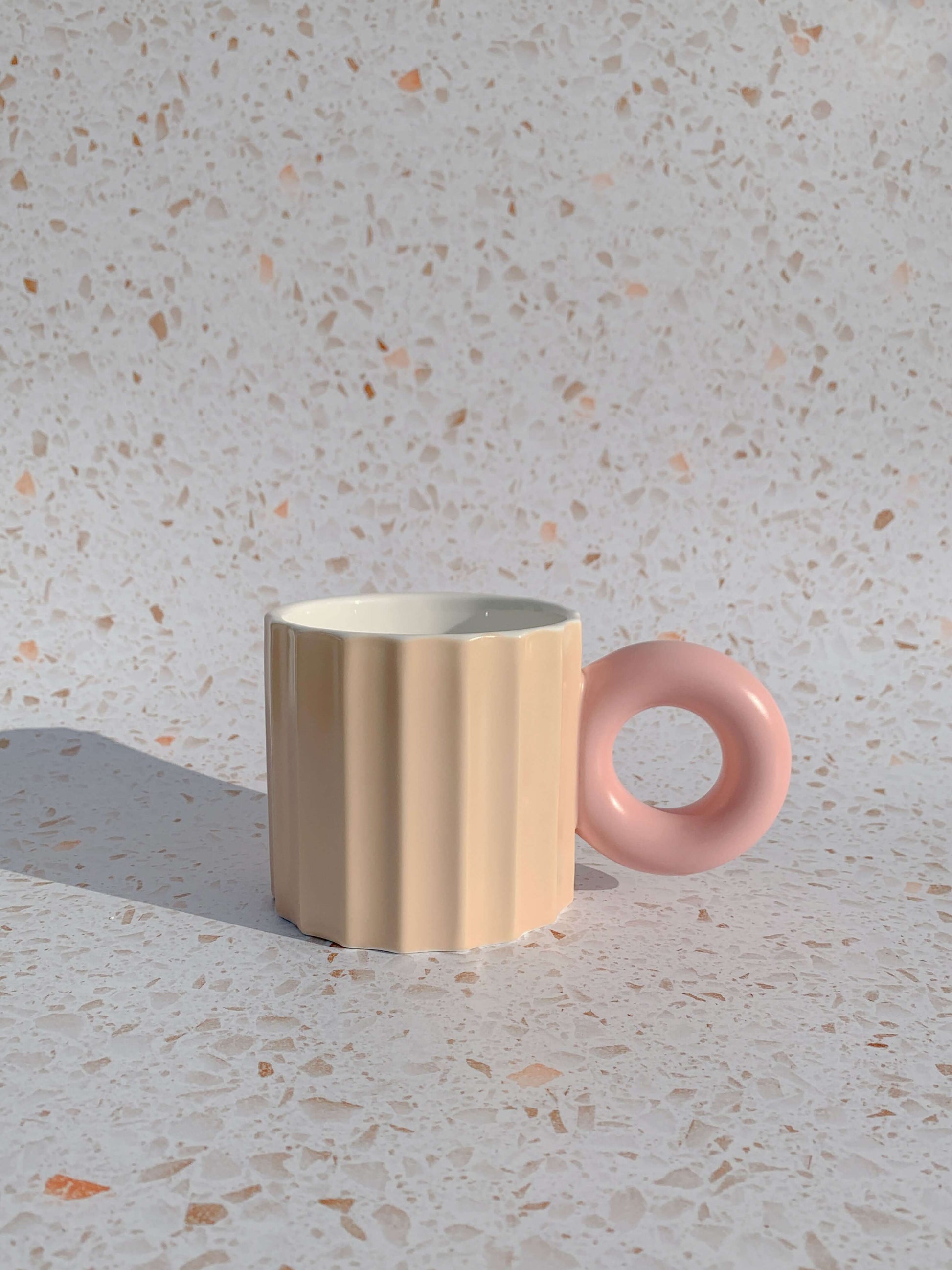 Pastel pink ribbed ceramic mug