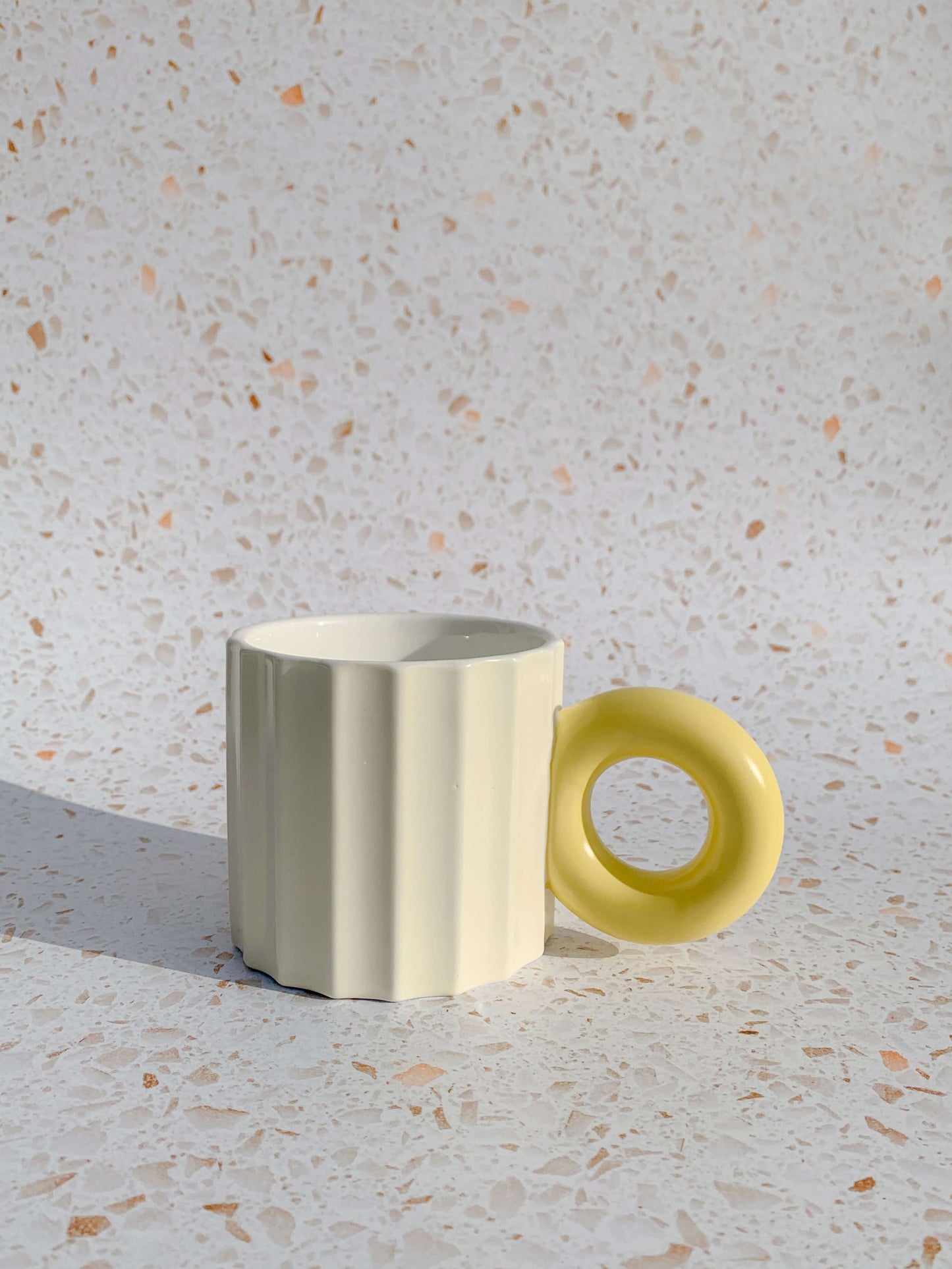 Pastel yellow ribbed ceramic mug